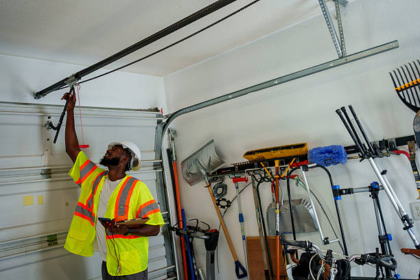 Professional Garage Door Panel Replacement technician working in Poynette, WI